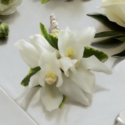 White Mini Cymbidium Boutonniere –  Towne Florist, Lumberton NC
